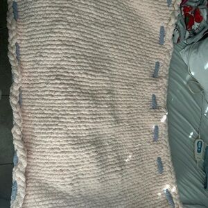 Cozy Cream Knit Blanket with Blue Accents